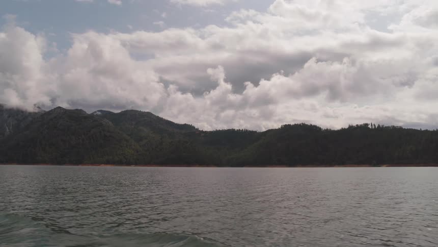 Water rippling on a mountain lake on a cloudy day