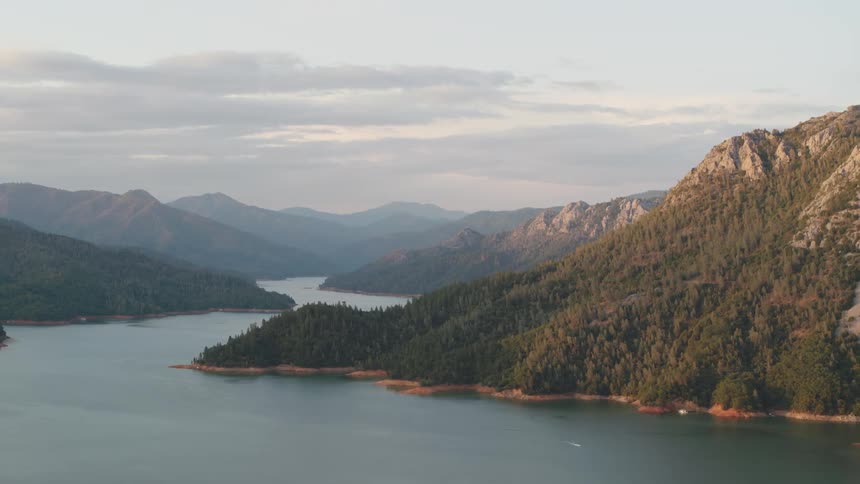 An aerial view of a river is displayed