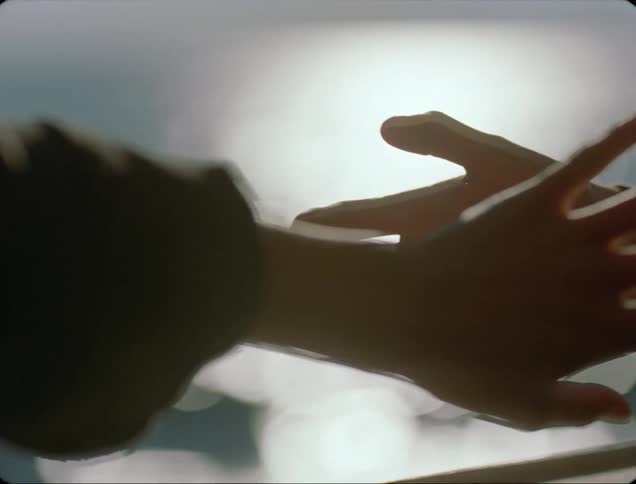 Hands moving in meditative patterns