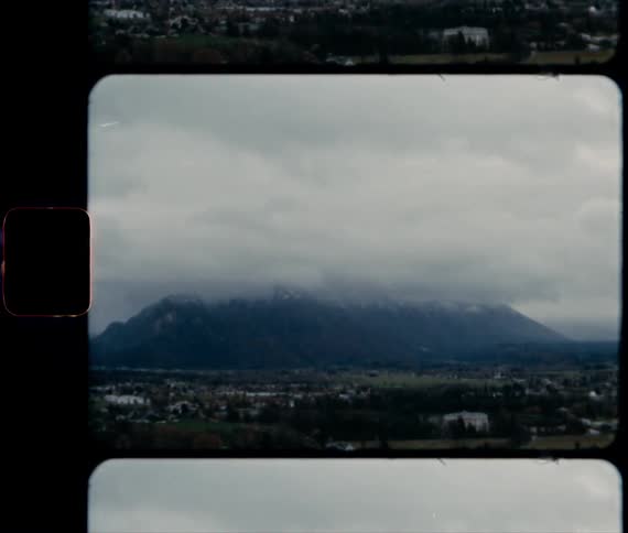 Low laying clouds cover the Austrian Alps in Salzburg
