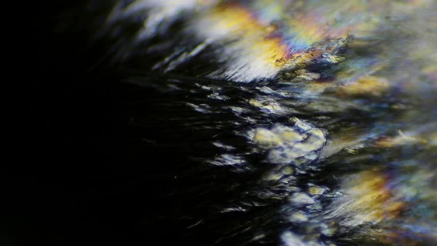 Black white yellow pink and blue colors that look like ice freezing
