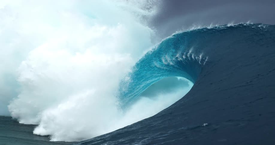 Ocean waves are displayed during midday