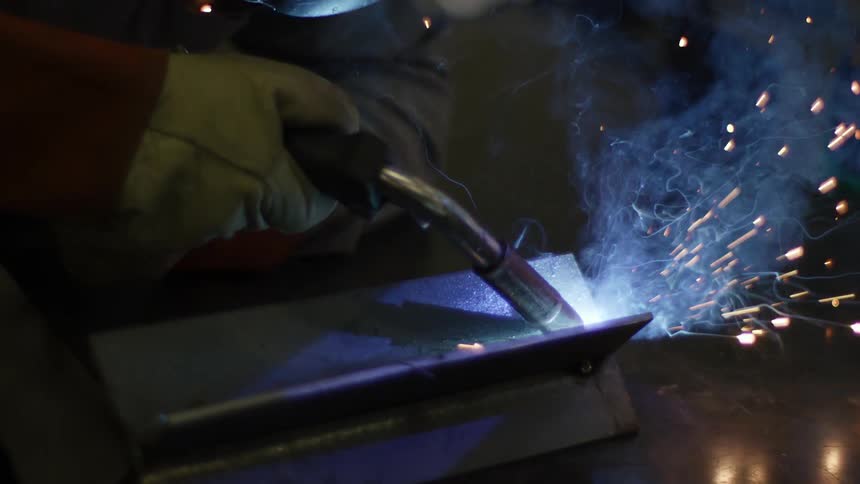 A man welding steel