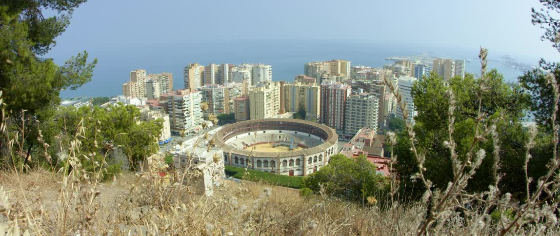 An aerial view of an urban city is displayed