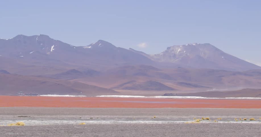 A mountain range with snow in the daytime