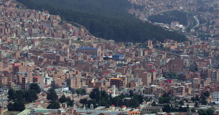 An aerial view of a downtown city is displayed