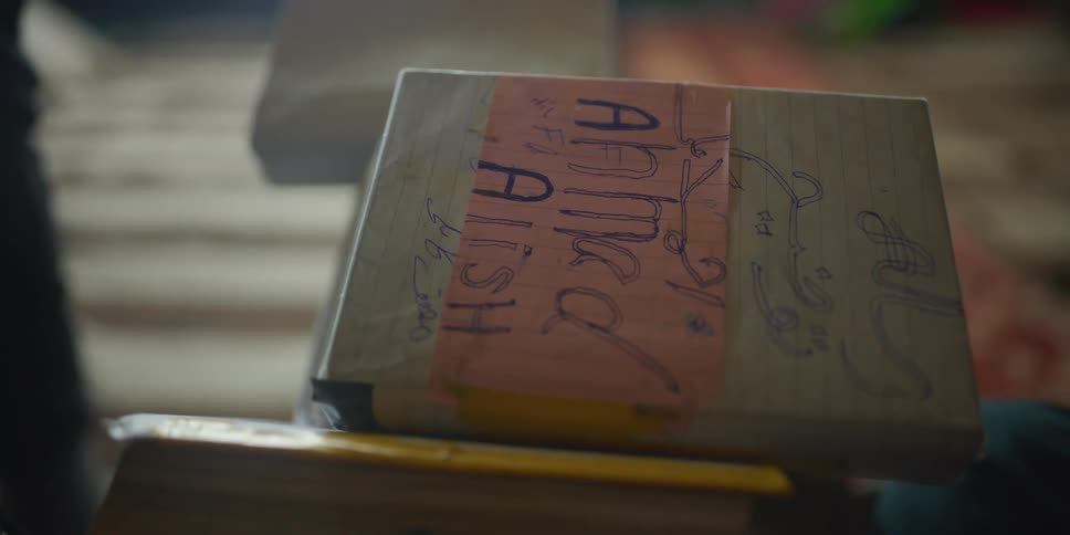 A book sitting in a classroom with people