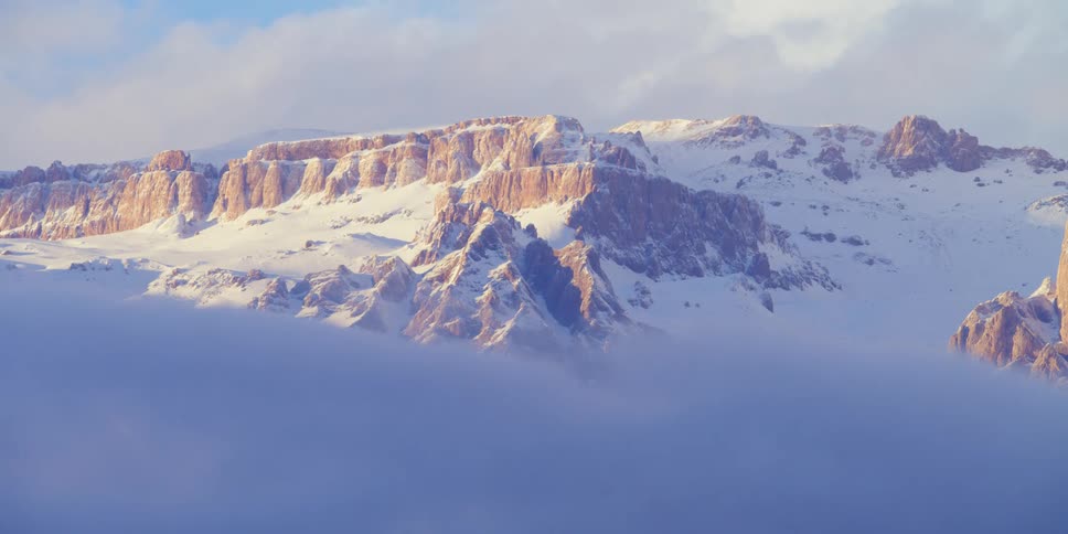 The mountain is covered with snow
