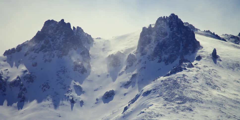 Snow covered peaks on a mountain