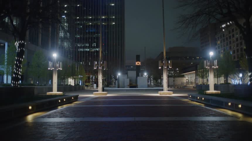 A downtown city is displayed at night