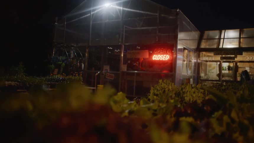 The closed sign is lit on the store