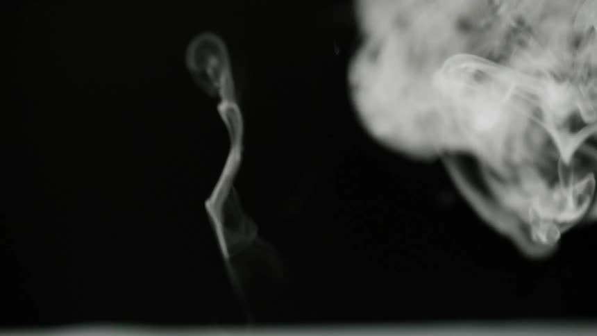 Black white and gray colors that look like smoke falling