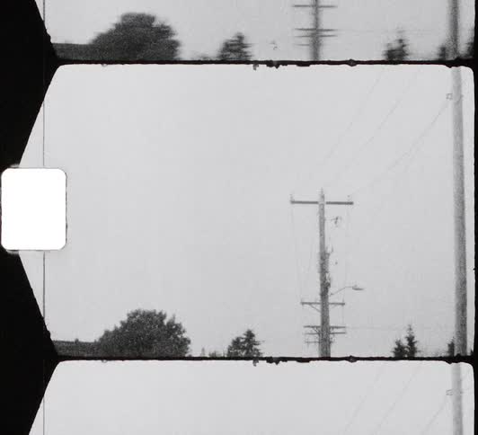 Utility poles and power lines in a town