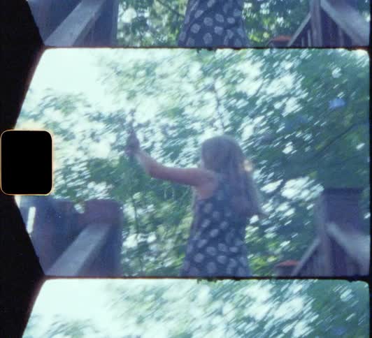 Blonde girl climbs outside stairs holding plants 8mm