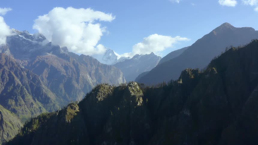 Aerial view of high mountains with a valley