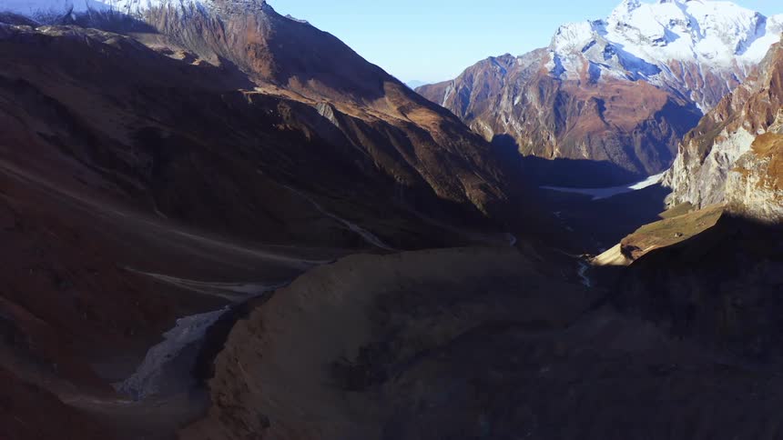 An aerial view of a mountain range and valley