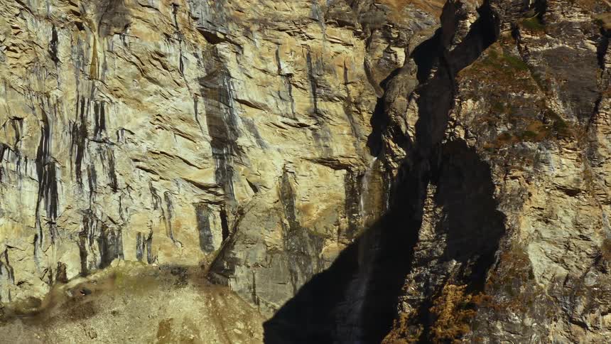 A rocky mountain with cliffs
