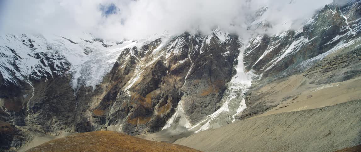 Aerial view of mountains in the distance is displayed