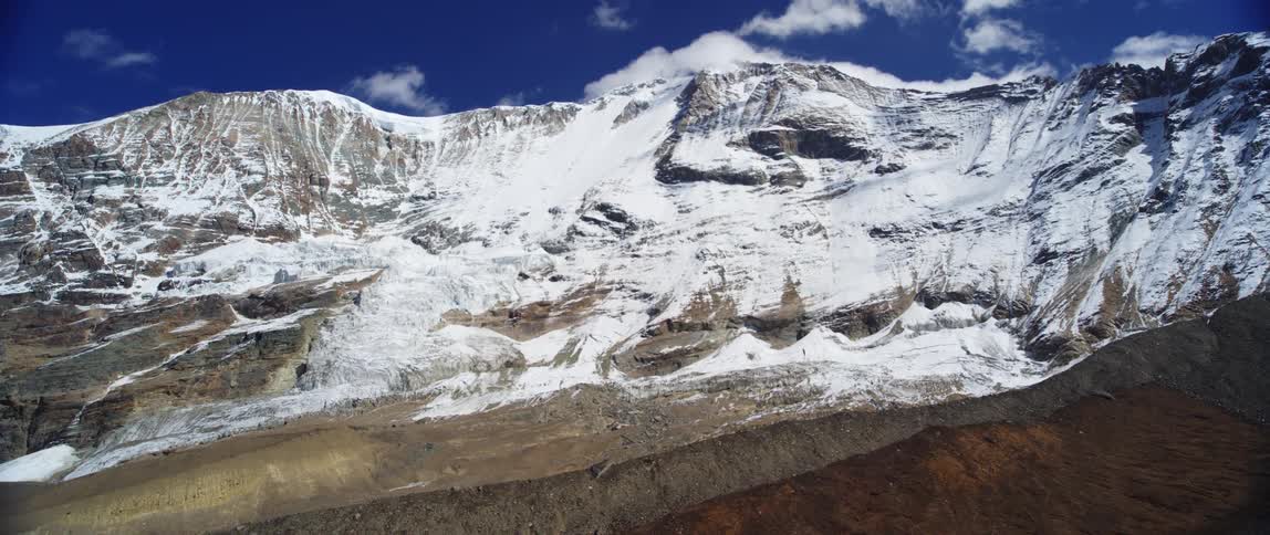 Aerial view of a mountain range displayed during the daytime
