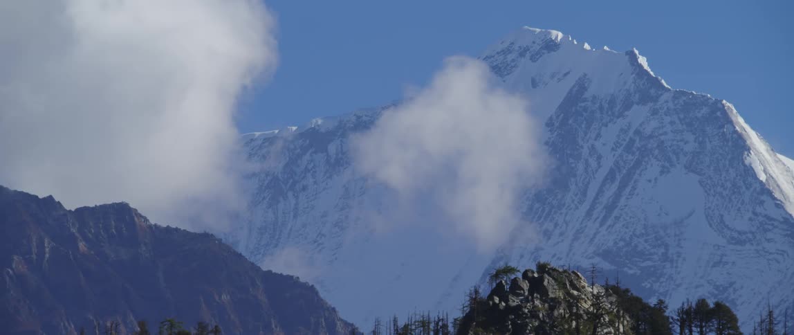An aerial view of mountains is displayed