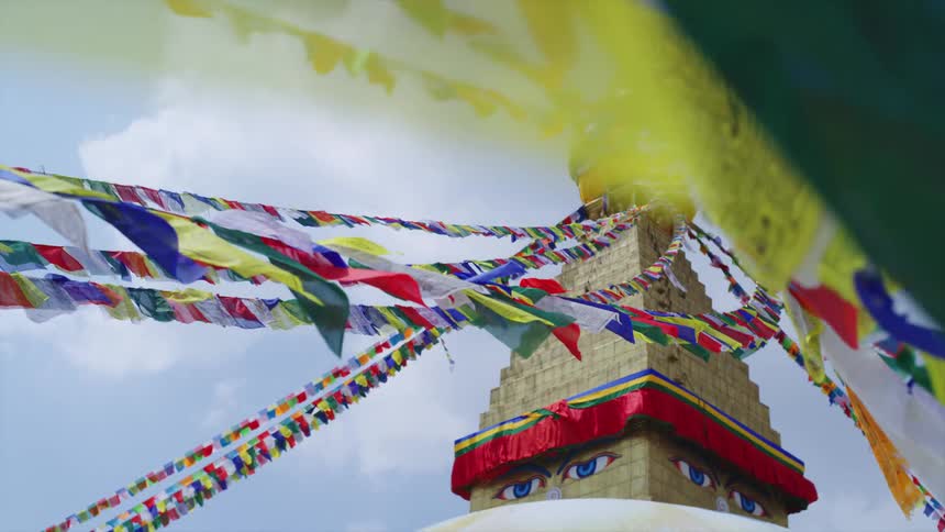 Flags in the breeze at a tower in the city