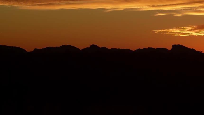 The sun is setting in the horizon