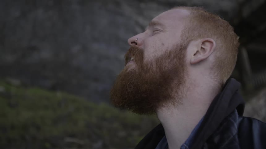 A man looking up at something