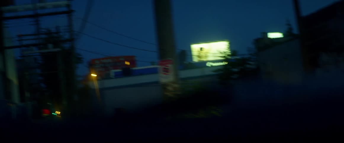 A car makes a turn in the alley