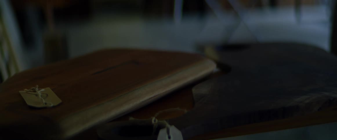 A piece of wood on a table in a shop