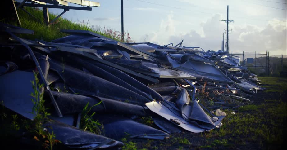 Piles of scrap in a junkyard on a sunny day