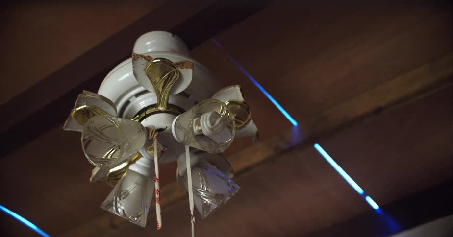 Decorative lamp with light bulbs hanging from a wooden roof