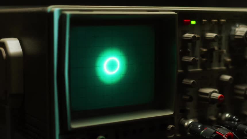 Lights flash on an oscilloscope screen