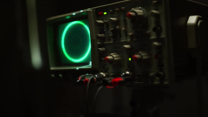 Lights flashing on a oscilloscope screen