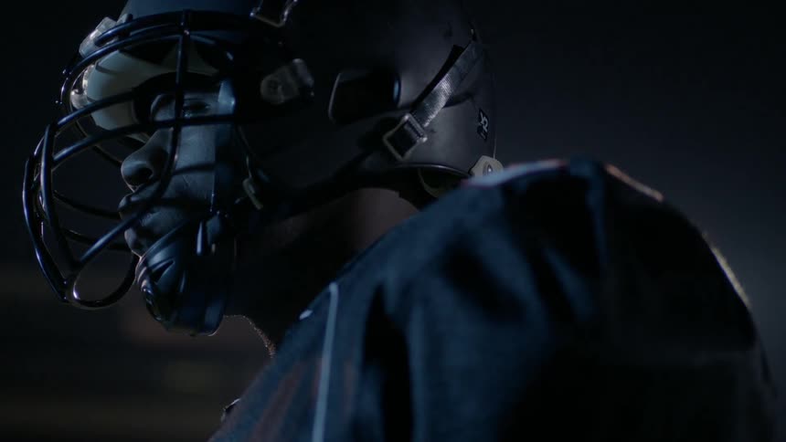 A football player staring into the distance