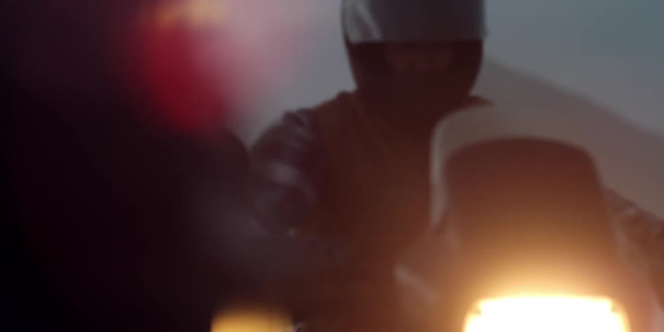 Close up of a person riding a motorcycle