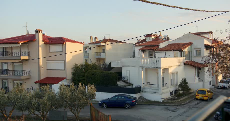 Multistory housing units in a city neighborhood during the day