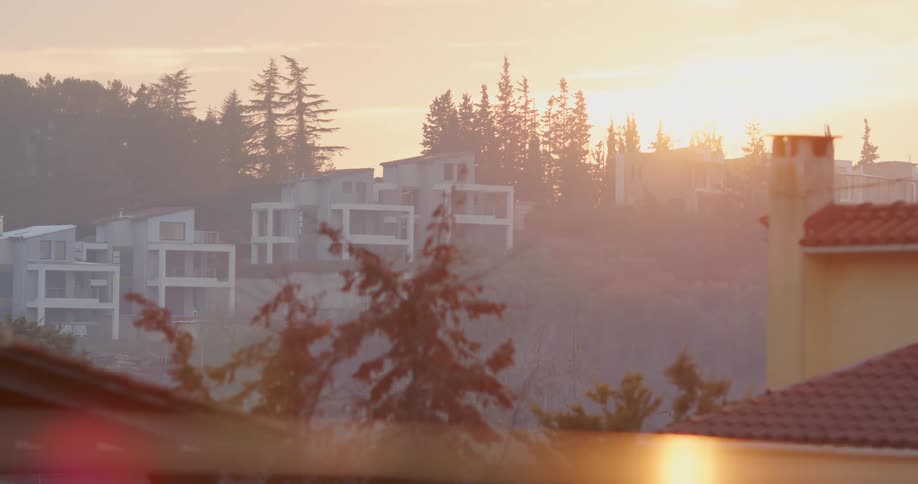 A view of some houses on a hill