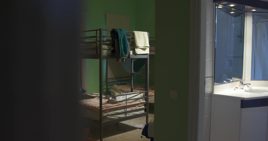 Bunk beds and sink in a room