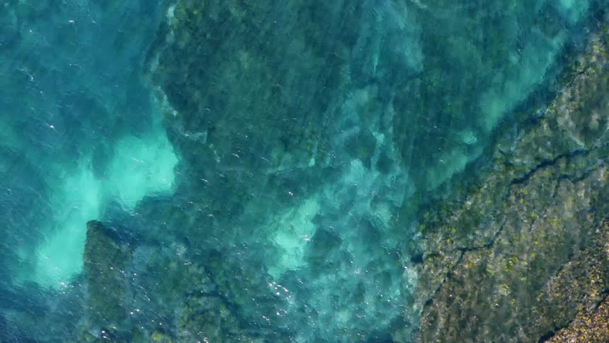 Aerial view of ocean is displayed in the daytime