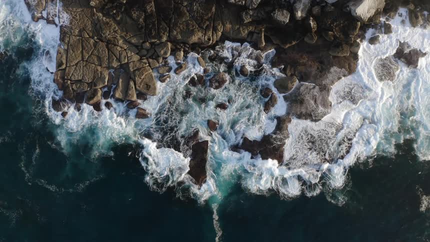 Waves crashing on a rocky shore