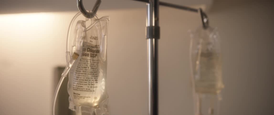 Saline solution in iv drip bags on metal stand