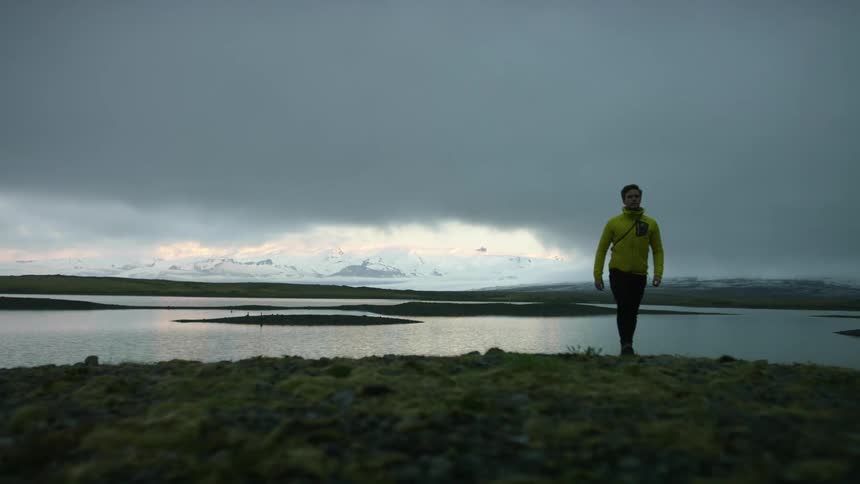 A man walking away from the shore