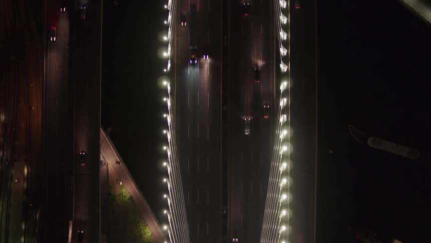 Birds eye view of cars driving on streets at night