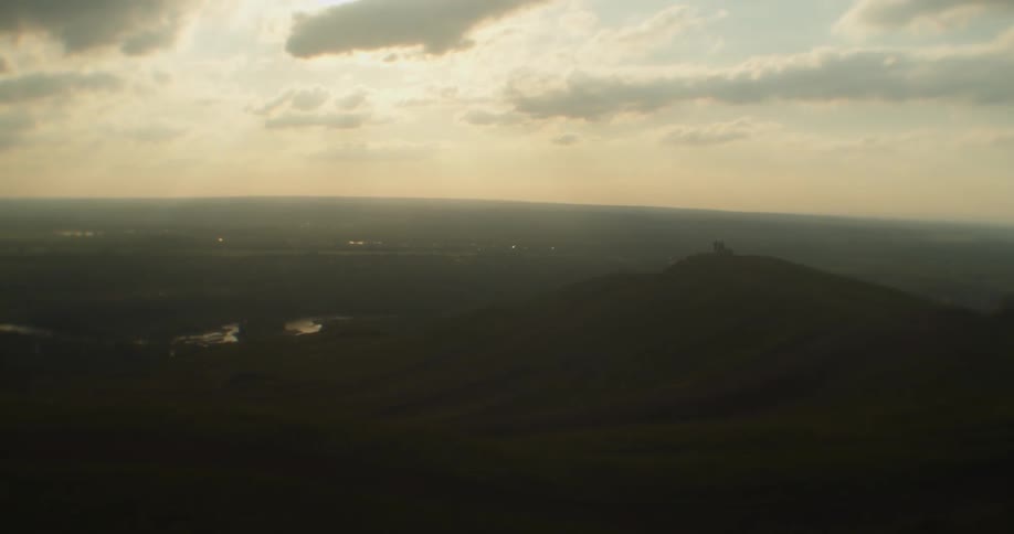 Views from the top of a hill looking into a valley