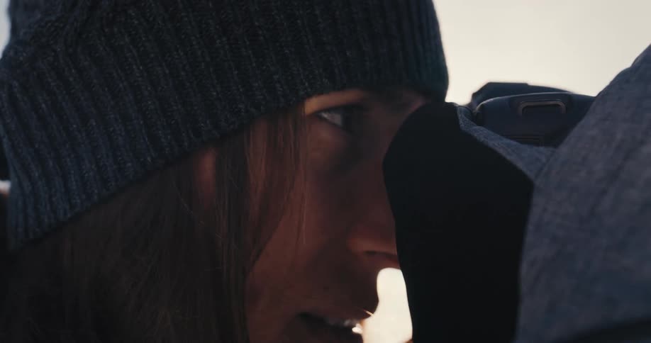 A person using a camera to take a photo of something