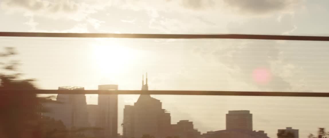 Skyline of citys downtown skyscrapers at sunset