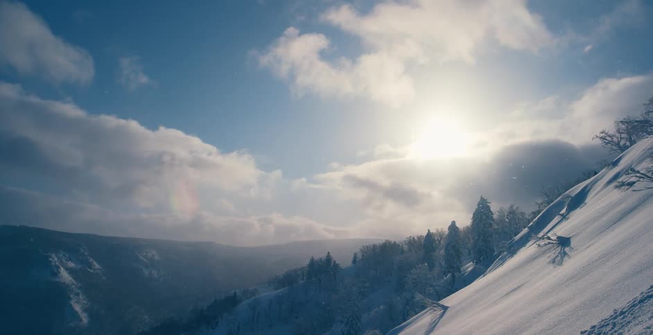 Aerial view of mountains is displayed in winter