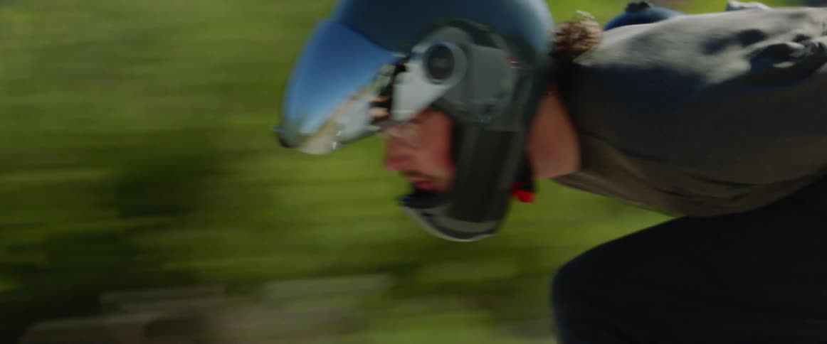 Skateboarders with helmets ride on highway at high speed