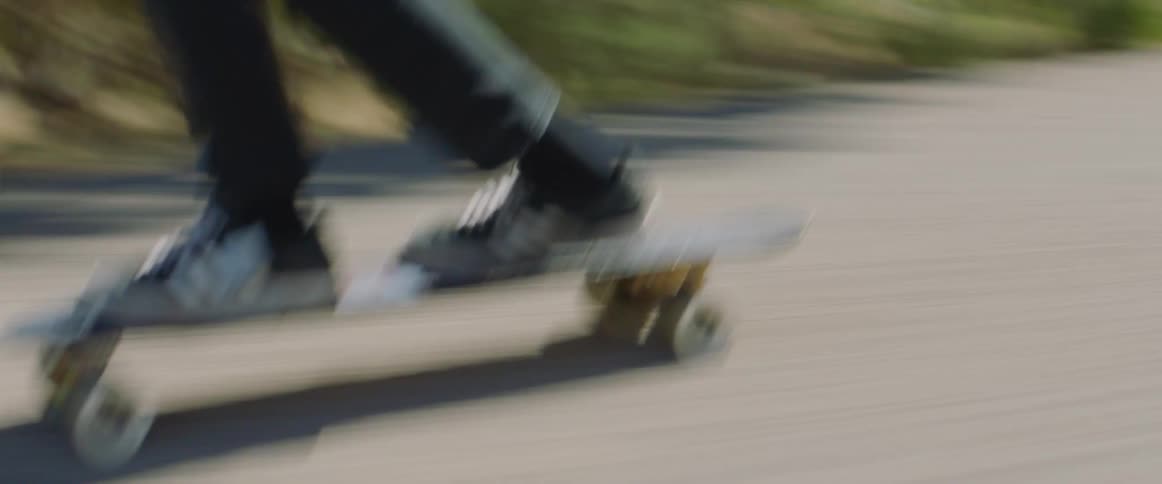 People on skateboards on road