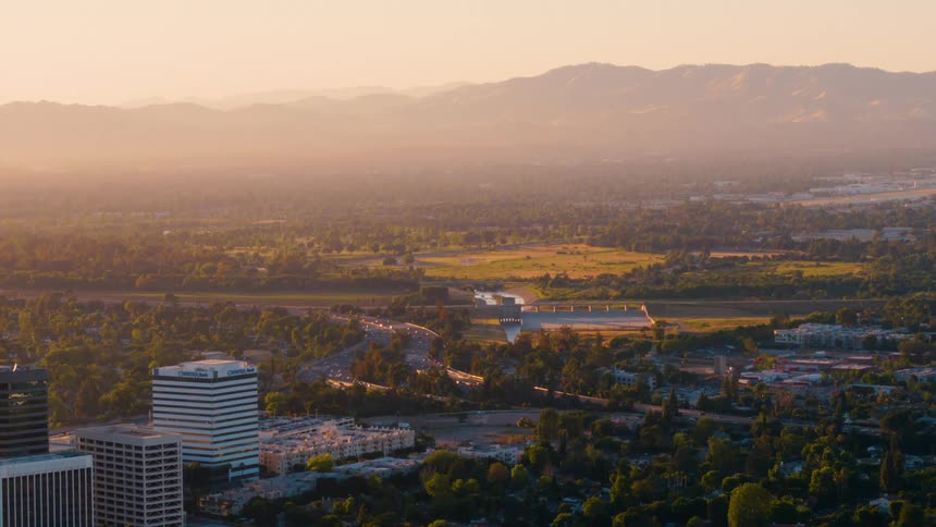 Aerial view of downtown city is displayed at dusk
